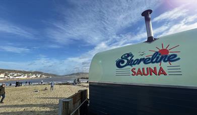 New location of the Shoreline Sauna on the sandy beach at Lyme Regis, Dorset