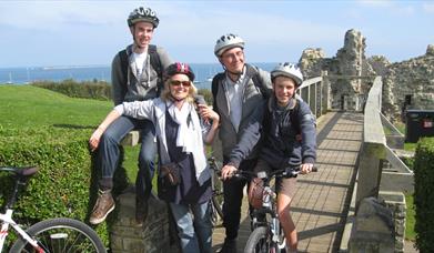 Family on bikes at Sandsfoot Casle, Weymouth