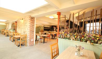 a counter with delicious cakes and bakes to treat yourself