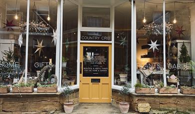 The Country Crib shop front, our homeware and garden and gift shop, located at 18a Cheap Street, Sherborne, DT9 3PX
