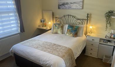 Luxury King room 1 A delightful room with king-size bed ensuite shower and bath located at the back of our house.