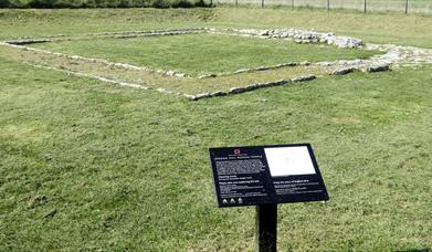 Jordan Hill Roman Temple, with English Heritage information board.