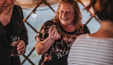 Woman enjoying a canape