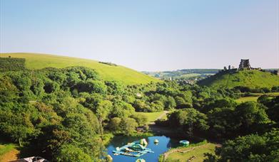 Dorset Adventure Park inflatable water course at Corfe Castle in Dorset