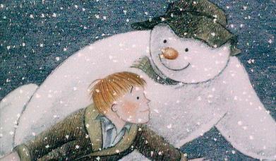 An image from the animated film 'The Snowman', the snowman is holding James as they fly over London.