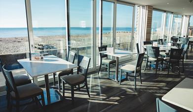 Noisy Lobster on Avon Beach with sea views and outdoor seating.