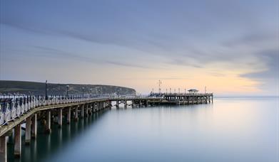 Early light at Swanage Pier in Swanage Bay, Dorset