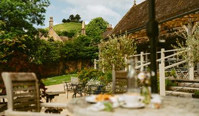 Alfresco dining at Symondsbury Kitchen on the Symondsbury Estate near Bridport in Dorset