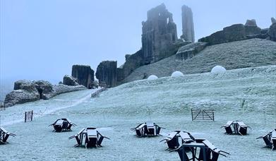 Picture of Corfe Castle in the snow.