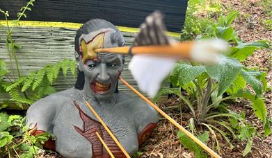A Zombie figure with arrows coming out of it from a 3D archery session run by Insight Activities in Dorset