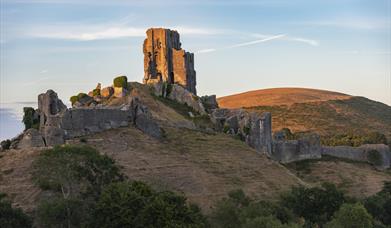 Sunset photo of Corfe Castle in Dorset